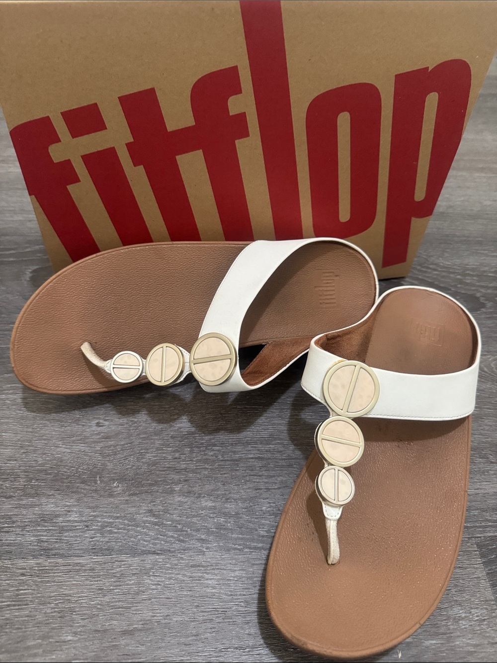 Fitflop White Leather Toe-Post Sandals with Gold Disc Accents